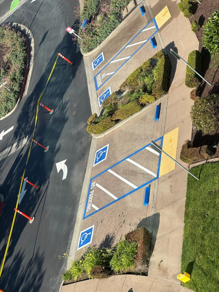 Vibrant blue ADA compliant handicap parking stall painting San Jose